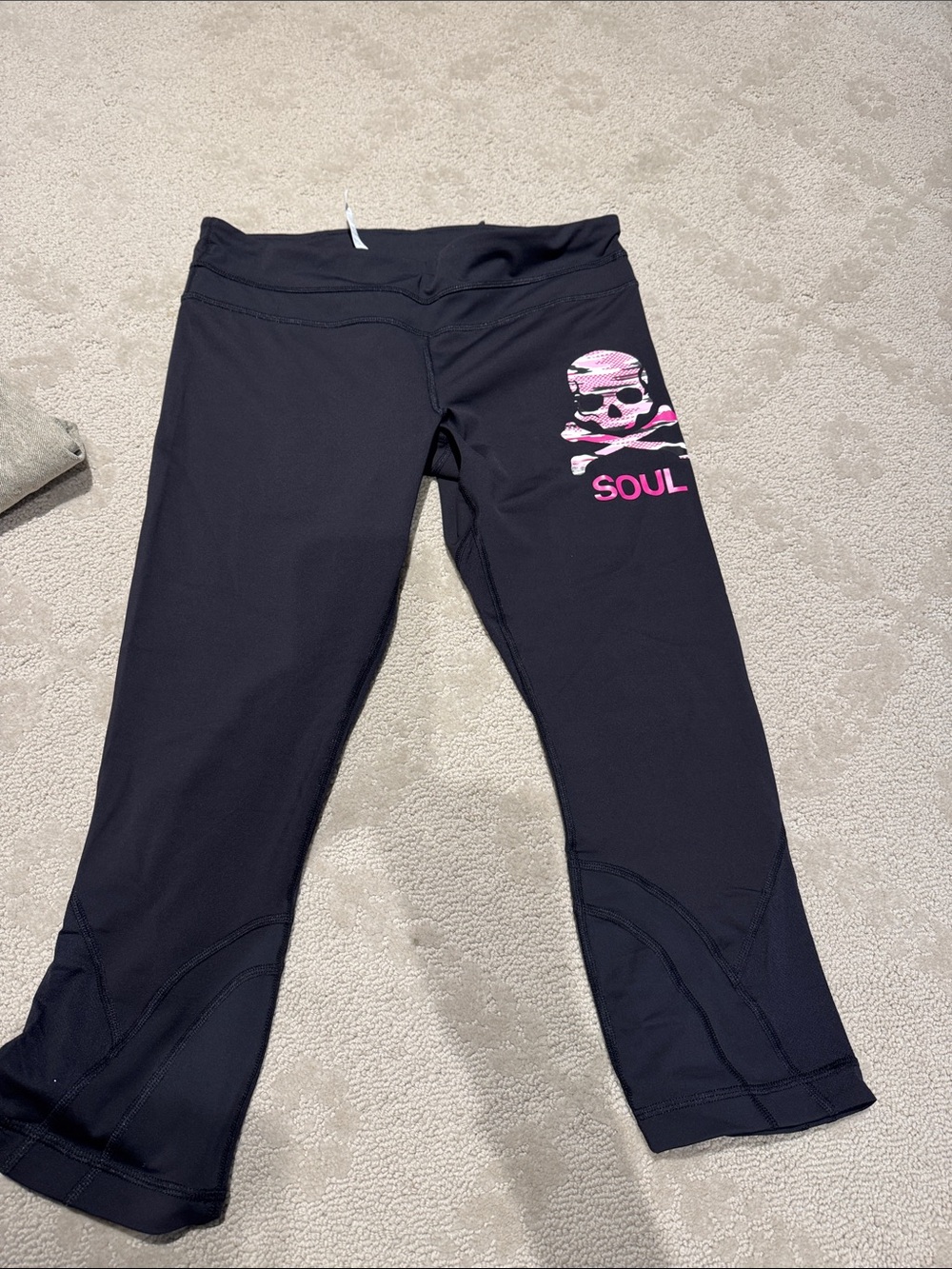 Black Athletic Cropped Lululemon Leggings with Pink Skull Graphic -